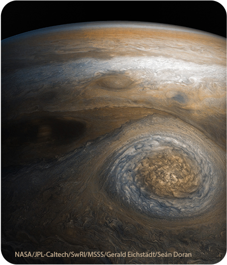 This storm is a long-lived anticyclonic oval named North North Temperate Little Red Spot 1 (NN-LRS-1); it has been tracked at least since 1993, and may be older still. An anticyclone is a weather phenomenon where winds around the storm flow in the direction opposite to that of the flow around a region of low pressure. It is the third largest anticyclonic oval on the planet, typically around 3,700 miles (6,000 kilometers) long. The color varies between red and off-white (as it is now), but this JunoCam image shows that it still has a pale reddish core within the radius of maximum wind speeds.